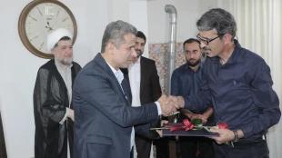دیدار سرپرست و مسئولین دانشگاه ملی مهارت لاهیجان با خانواده شهید «عابدینی» و جانباز «حسن مهدی پور» 5