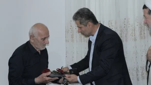 دیدار سرپرست و مسئولین دانشگاه ملی مهارت لاهیجان با خانواده شهید «عابدینی» و جانباز «حسن مهدی پور» 9