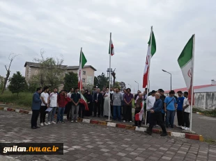 آیین غبارروبی یادمان شهید گمنام و اهتزاز پرچم جمهوری اسلامی ایران در دانشگاه ملی مهارت گیلان برگزار شد 6