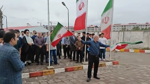 آیین غبارروبی یادمان شهید گمنام و اهتزاز پرچم جمهوری اسلامی ایران در دانشگاه ملی مهارت گیلان برگزار شد 8